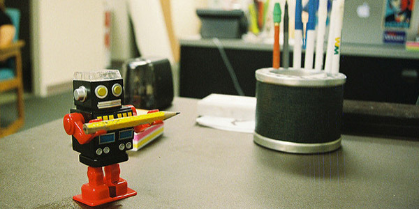 Robot Holding Pencil