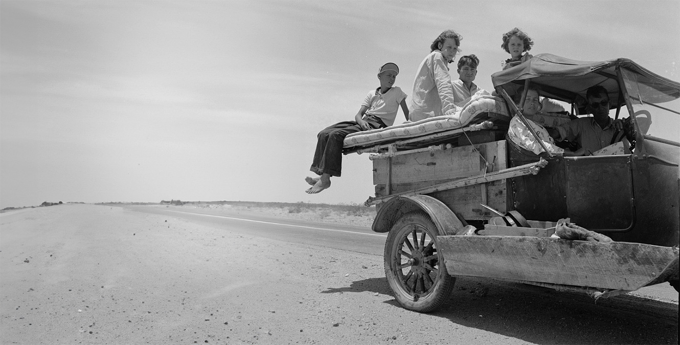 1937 - Migratory family traveling across the desert, U.S. Route 70, Arizona